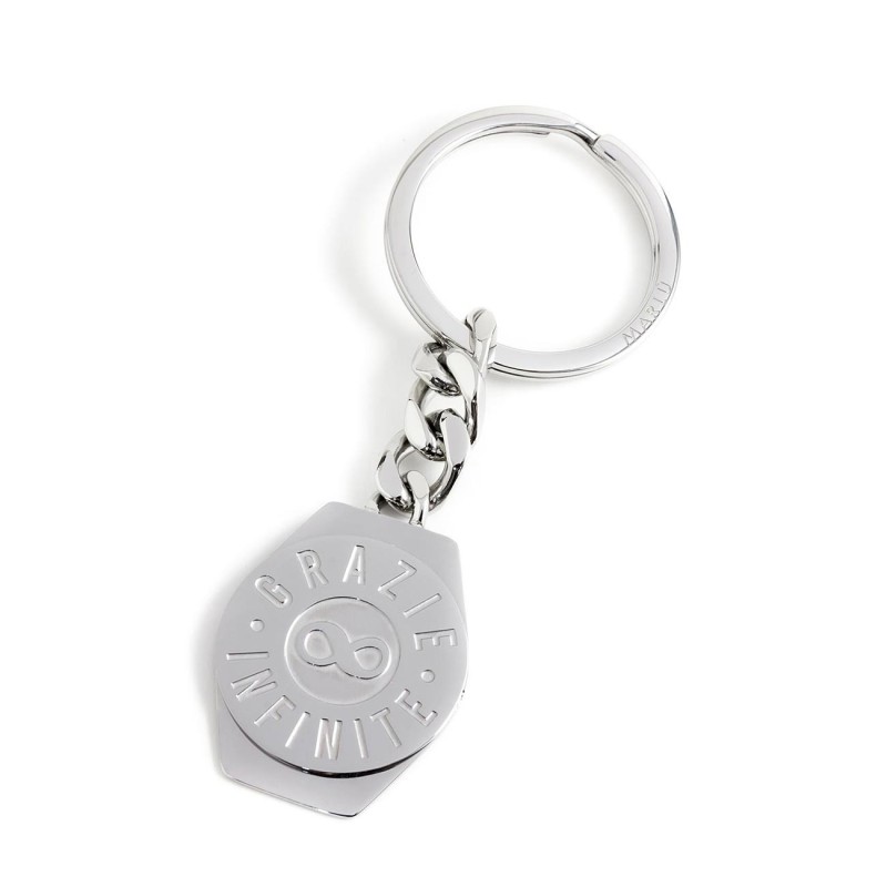 S.S. HESAGONAL KEYRING GRAZIE INFINITE S.steel keyring 30*24 mm, the pendant is hexagonal element where is weld a round medal, o S.S. HESAGONAL KEYRING GRAZIE INFINITE S.steel keyring 30*24 mm, the pendant is hexagonal element where is weld a round medal, o