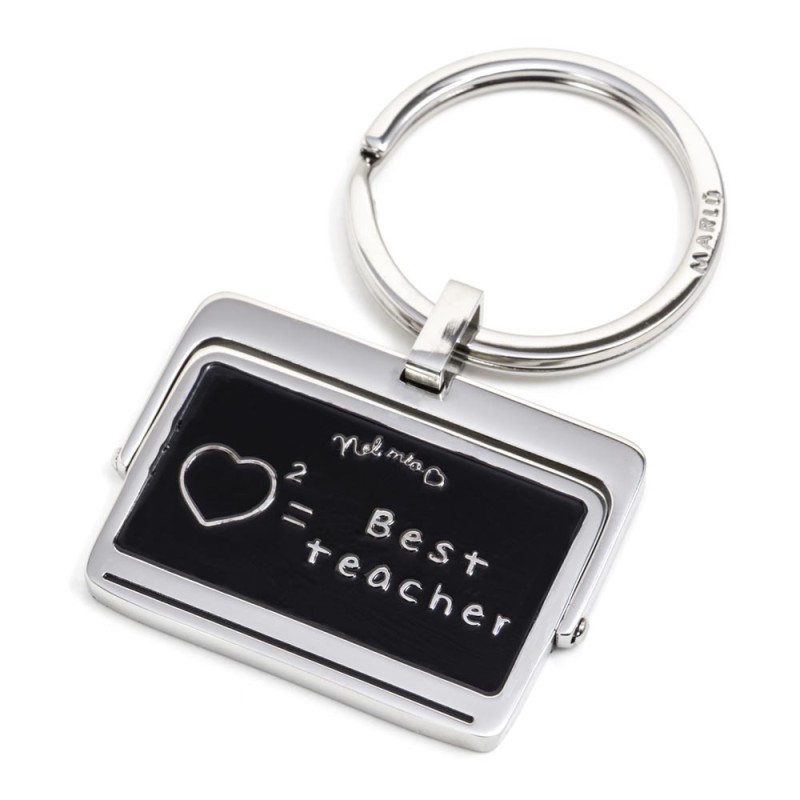 S.STEEL BLACKBOARD BEST TEACHER KEYRING 316L S.Steel revolving blackboard keyring. On the front there is the writing "Best teach S.STEEL BLACKBOARD BEST TEACHER KEYRING 316L S.Steel revolving blackboard keyring. On the front there is the writing "Best teach