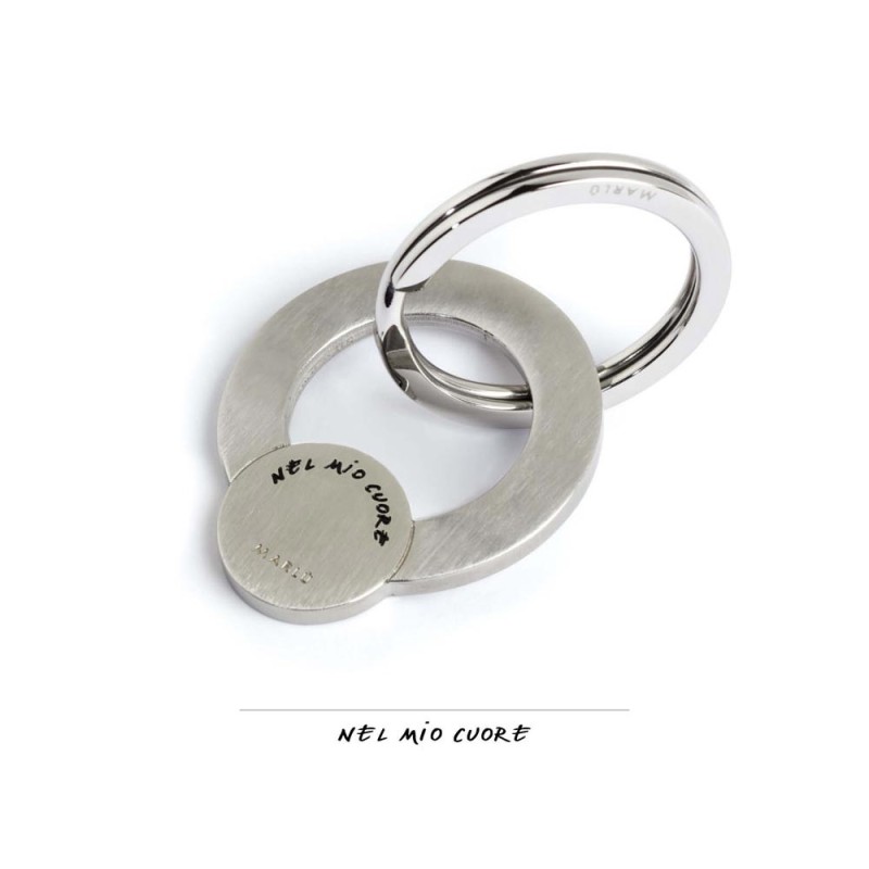 S.STEEL KEY RING S.Steel keyring, mat finishing with black enamel writting :"Per dirti ...che sei la mia famiglia"Diameter 3.2 S.STEEL KEY RING S.Steel keyring, mat finishing with black enamel writting :"Per dirti ...che sei la mia famiglia"Diameter 3.2