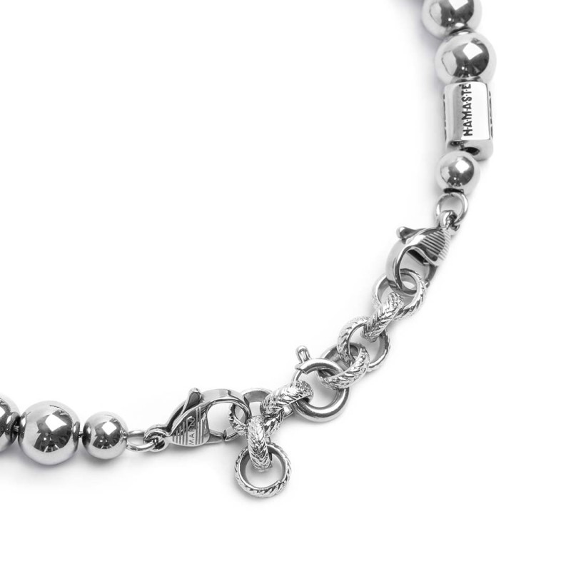 S.STEEL BR HEMATITE 8MM S.Steel bracelet with polished hematite spheres 8 mm diameter, in the center alternated with 4 polished S.STEEL BR HEMATITE 8MM S.Steel bracelet with polished hematite spheres 8 mm diameter, in the center alternated with 4 polished