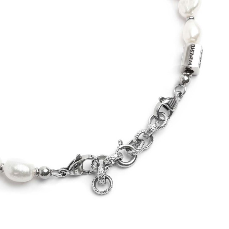 S.STEEL BR IRREGULAR PEARLS CHAIN S.steel bracelet with irregular pearls 7*9 mm, alternated with s.steel rings 3*1,20 mm. At the S.STEEL BR IRREGULAR PEARLS CHAIN S.steel bracelet with irregular pearls 7*9 mm, alternated with s.steel rings 3*1,20 mm. At the