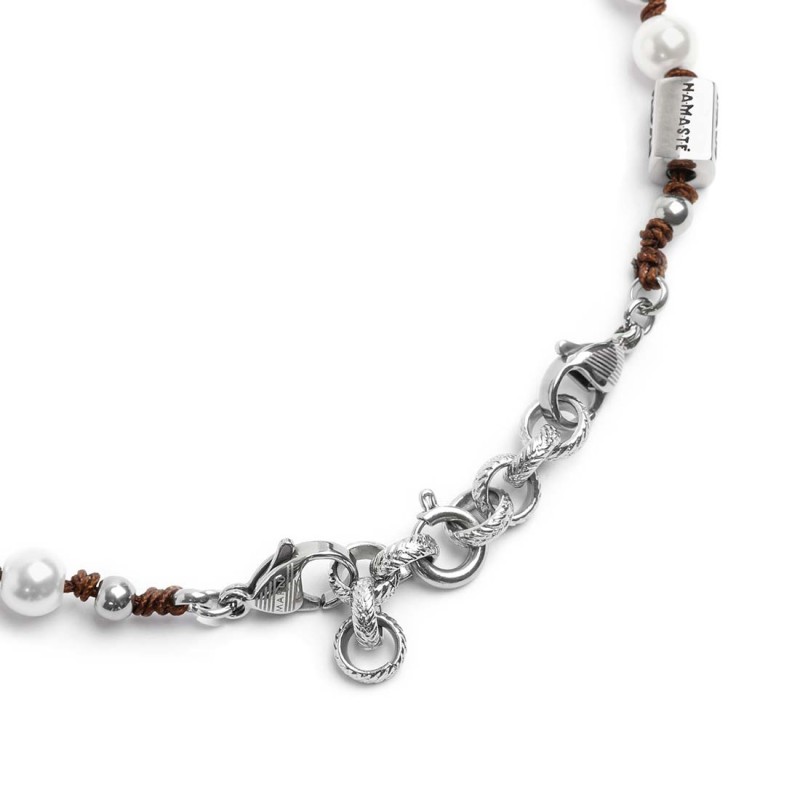 S.STEEL BR ROPE WITH PEARLS 6,20MM S.steel bracelet with brown cotton rope 0,80 mm diameter with pearls 6,20 mm diameter. At the S.STEEL BR ROPE WITH PEARLS 6,20MM S.steel bracelet with brown cotton rope 0,80 mm diameter with pearls 6,20 mm diameter. At the