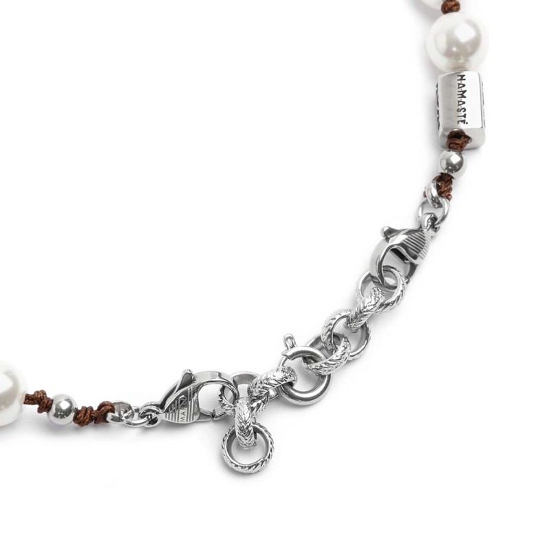 S.STEEL BR ROPE WITH PEARLS 8MM S.steel bracelet with brown cotton rope 0,80 mm diameter with pearls 8 mm diameter. At the end p S.STEEL BR ROPE WITH PEARLS 8MM S.steel bracelet with brown cotton rope 0,80 mm diameter with pearls 8 mm diameter. At the end p