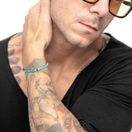 Bracciale con dischetti turchesi occhio di tigre e conchiglie bianche Bracciale con dischetti turchesi occhio di tigre e conchiglie bianche