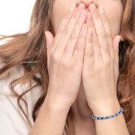 Bracciale con rondelle in pietra ed elementi in ematite