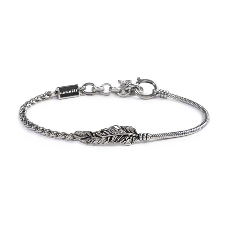 S.STEEL BR WITH FEATHER S.steel bracelet with round snake chain 2,30 mm diameter and sonaglio chain 3 mm width. On the center s. S.STEEL BR WITH FEATHER S.steel bracelet with round snake chain 2,30 mm diameter and sonaglio chain 3 mm width. On the center s.