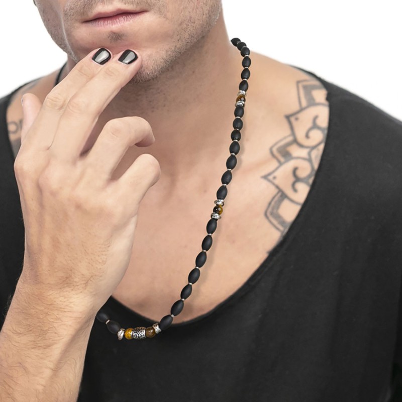 S.STEEL NECKLACE BLACK ONYX AND TIGER EYE S.steel necklace with black onyx rice beads 9*6,30 mm, alternated with s.steel polishe S.STEEL NECKLACE BLACK ONYX AND TIGER EYE S.steel necklace with black onyx rice beads 9*6,30 mm, alternated with s.steel polishe