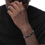Bracciale con catena snake con elemento centrale e dischetti in pietra lavica Bracciale con catena snake con elemento centrale e dischetti in pietra lavica