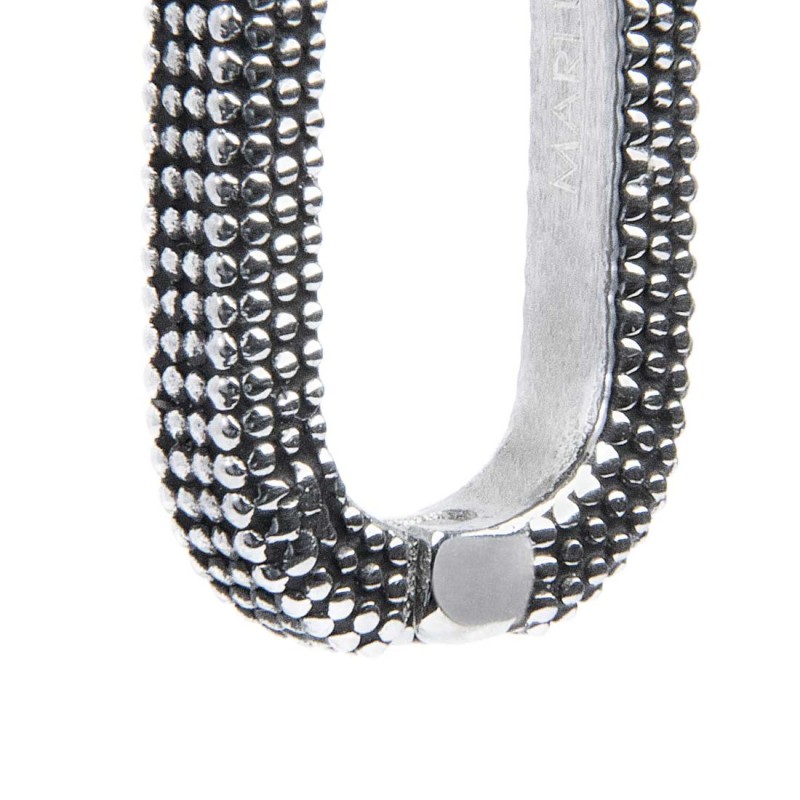 S.S. SINGLE OVAL EARRING WITH DOTS TEXTURE S.steel single oval hoop earring 11,75*16,70 mm with dots texture by casting and mat