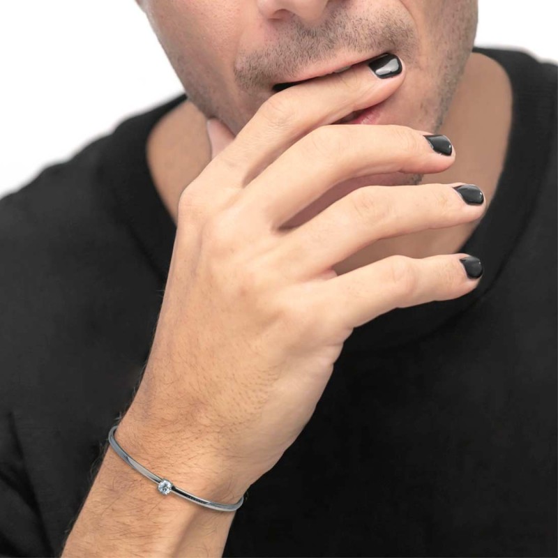 Bracciale rigido con zircone 5,25mm centrale e zirconi alle estremità Bracciale rigido con zircone 5,25mm centrale e zirconi alle estremità