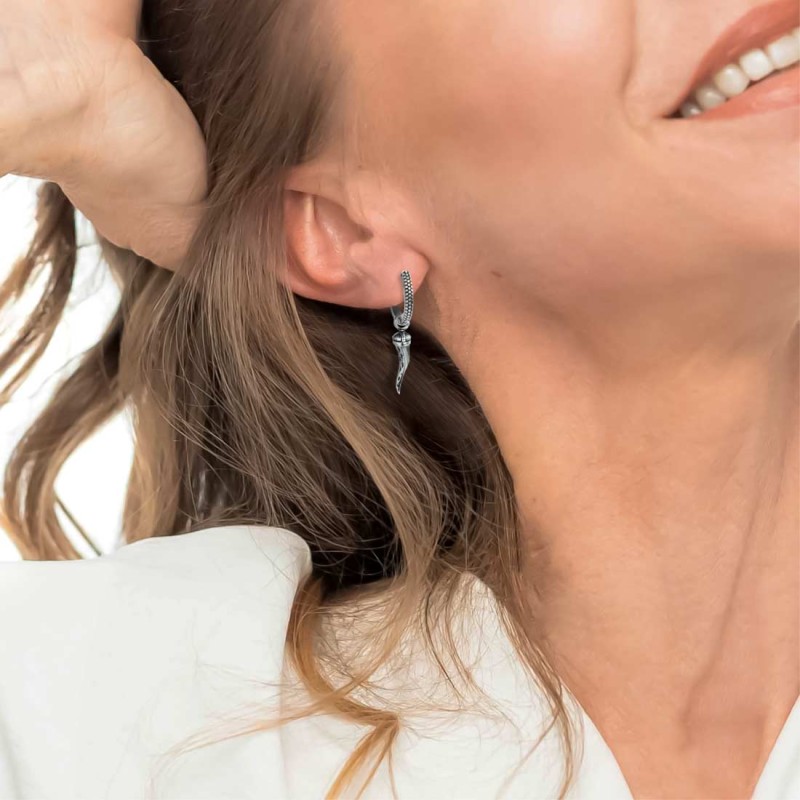 S.S SINGLE ROUND EAR WITH HORN PENDANT Polished s.steel single round earring 15,15 mm diameter 2,10 mm thickness, with mat black S.S SINGLE ROUND EAR WITH HORN PENDANT Polished s.steel single round earring 15,15 mm diameter 2,10 mm thickness, with mat black