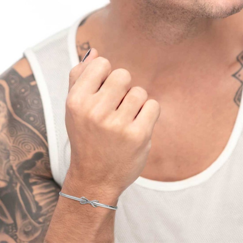 Bracciale rigido infinito con zirconi bianchi