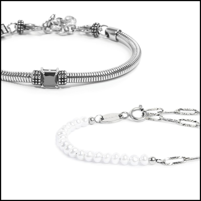 Bracciale con zircone nero centrale e bracciale con perle Bracciale con zircone nero centrale e bracciale con perle