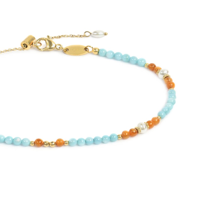 Cavigliera con elementi madreperla colorati e perle bianche irregolari Cavigliera con elementi madreperla colorati e perle bianche irregolari