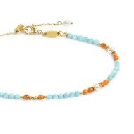 Cavigliera con elementi madreperla colorati e perle bianche irregolari