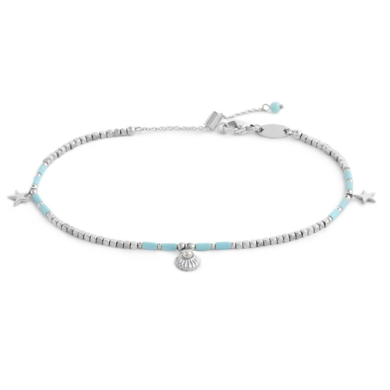 Cavigliera con ematite cubica alternata a perline conchiglia e stelle marine pendenti Cavigliera con ematite cubica alternata a perline conchiglia e stelle marine pendenti
