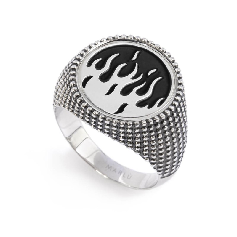 S.STEEL ROUND PLATE WITH FLAMES Polished s.steel round plate by casting 16,10 mm diameter, 1 mm thickness. On the front side fla