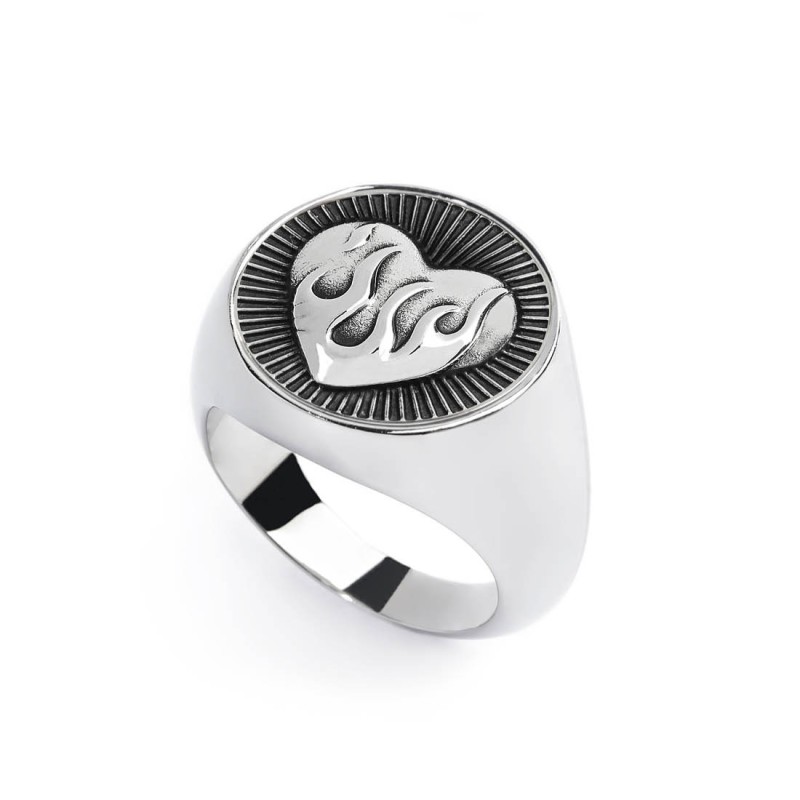 S.STEEL ROUND PLATE WITH HEART WITH FLAMES Polished s.steel round plate by casting 16,10 mm diameter, 1 mm thickness. On the fro S.STEEL ROUND PLATE WITH HEART WITH FLAMES Polished s.steel round plate by casting 16,10 mm diameter, 1 mm thickness. On the fro