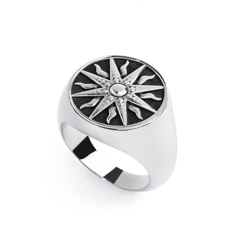 S.STEEL ROUND PLATE WITH SUN Polished s.steel round plate by casting 16,10 mm diameter, 1 mm thickness. On the front side sun po