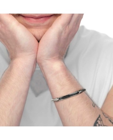 Bracciale pelle nera intrecciata e catena fishbone