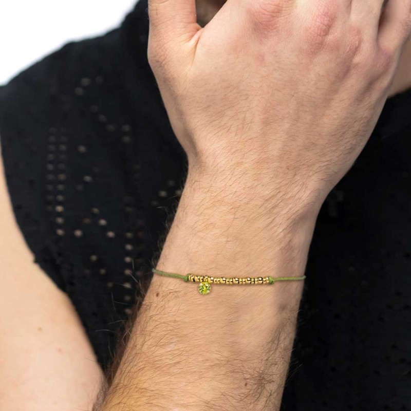 Bracciale cordino con elementi acciaio e zircone pendente