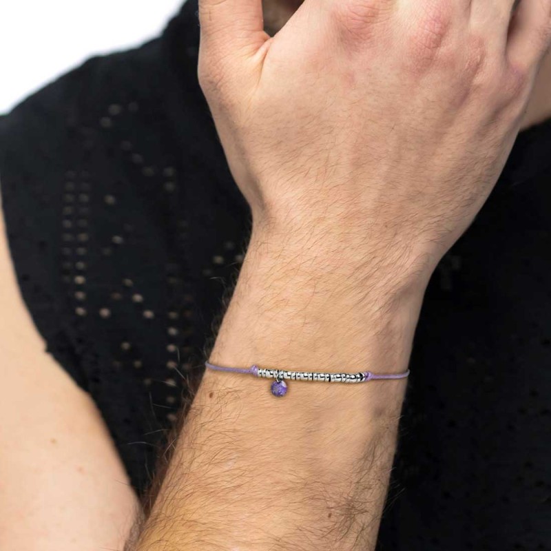 Bracciale cordino con elementi acciaio e zircone pendente