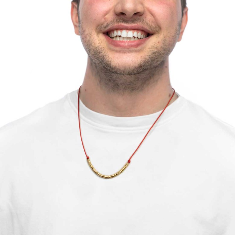 Collana cordino con sfere e rondelle al centro