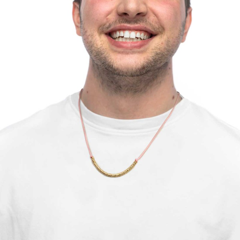 Collana cordino con sfere e rondelle al centro