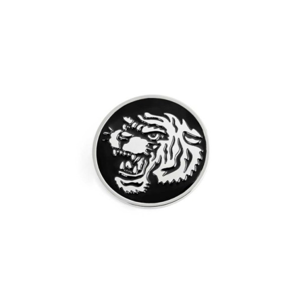 S.STEEL ROUND PLATE WITH TIGER Polished s.steel round plate 16,20 mm diameter, 1 mm thickness with on the front side in the midd