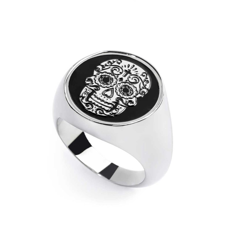 S.STEEL ROUND PLATE WITH MEXICAN SKULL Polished s.steel round plate 16,20 mm diameter, 1 mm thickness with on the front side mex S.STEEL ROUND PLATE WITH MEXICAN SKULL Polished s.steel round plate 16,20 mm diameter, 1 mm thickness with on the front side mex