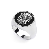 S.STEEL ROUND PLATE WITH MEXICAN SKULL Polished s.steel round plate 16,20 mm diameter, 1 mm thickness with on the front side mex